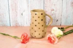 Polka dotted ceramic jug