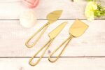 Stunning brass cheese knives